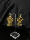 Oxidized Golden Jhumka Earrings With Golden Stones.