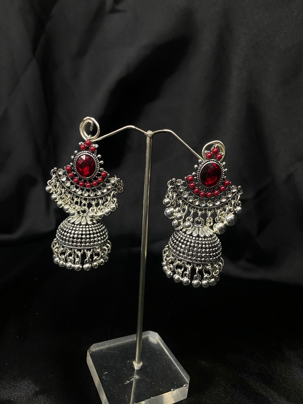 Oxidized Silver Jhumka Earrings With Red Stones.
