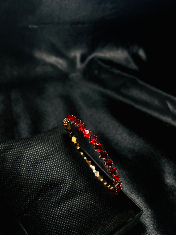 Gold-Toned Tennis Bracelet With Red Stones