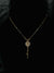 Elegant Gold-Tone Floral Pendant Necklace with Crystal Detailing