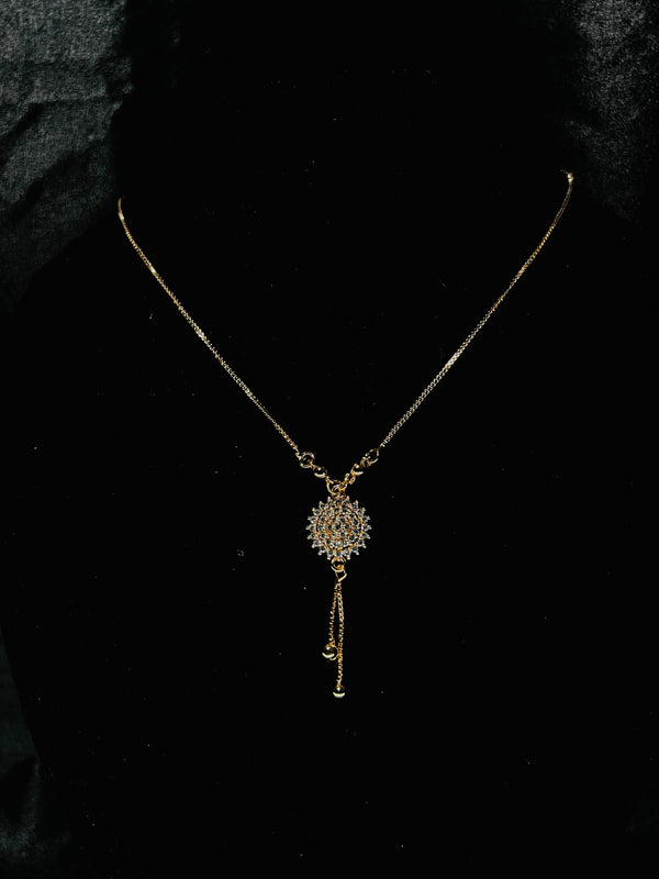 Elegant Gold-Tone Floral Pendant Necklace with Crystal Detailing