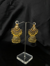 Oxidized Golden Jhumka Earrings With Golden Stones.