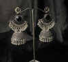 Oxidized Silver Jhumka Earrings With Black Stones.