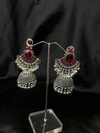 Oxidized Silver Jhumka Earrings With Red Stones.