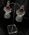 Oxidized Silver Jhumka Earrings With Red Stones.