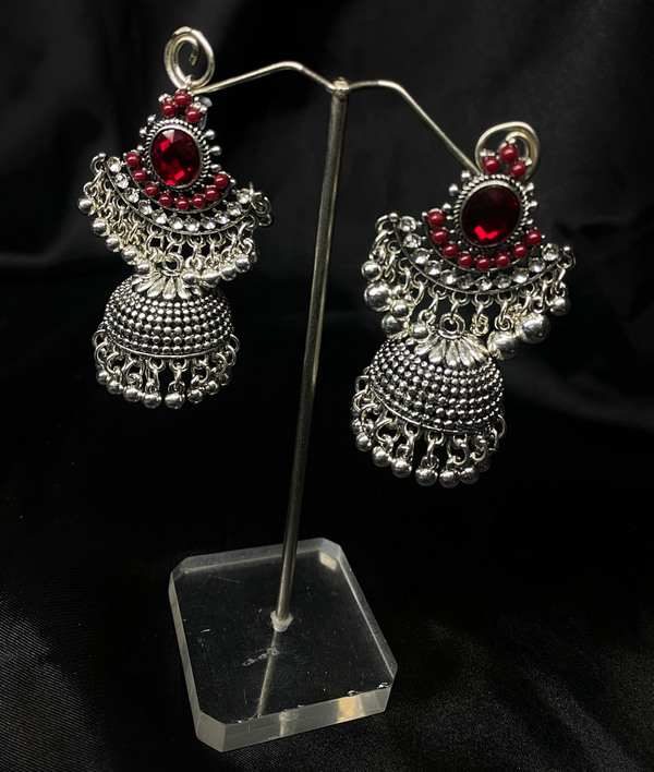Oxidized Silver Jhumka Earrings With Red Stones.