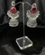 Oxidized Silver Jhumka Earrings With Red Stones.
