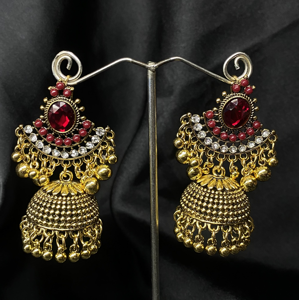 Oxidized Golden Jhumka Earrings With Re Stones.