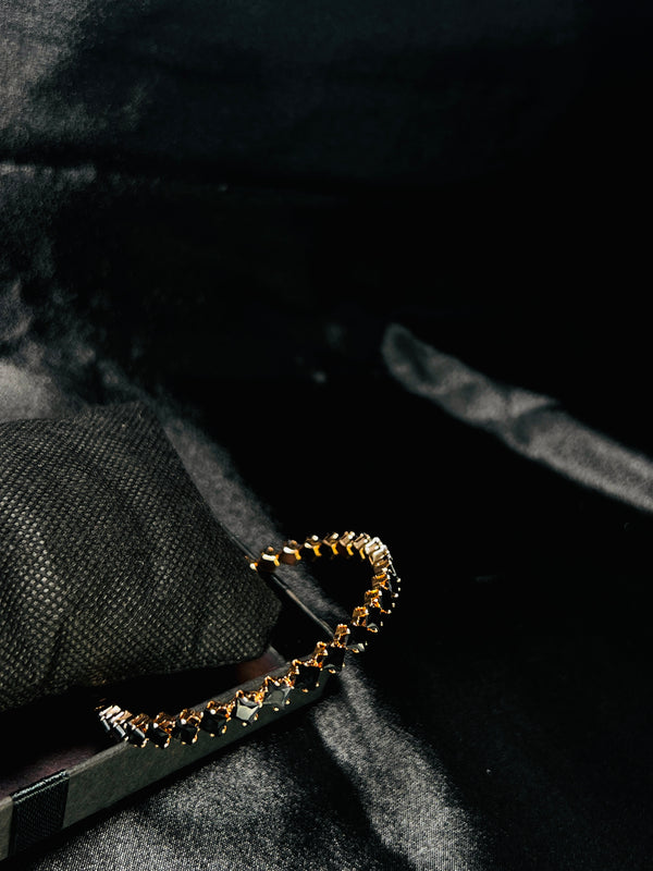 Gold-Toned Tennis Bracelet With Black Stones