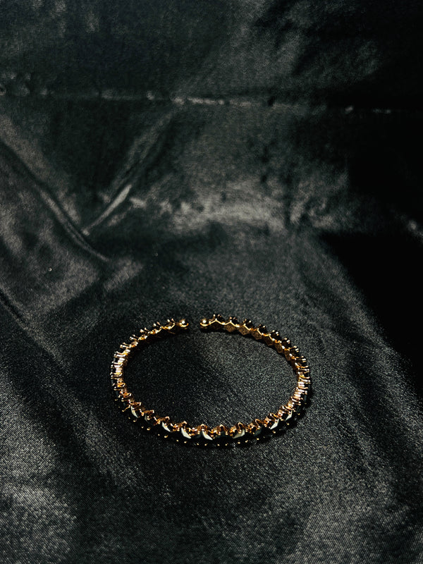 Gold-Toned Tennis Bracelet With Black Stones