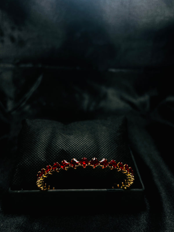 Gold-Toned Tennis Bracelet With Red Stones