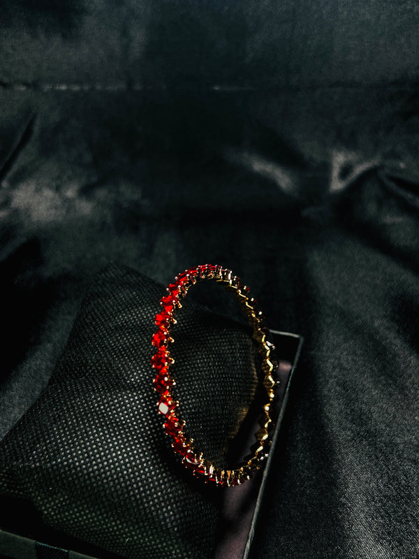 Gold-Toned Tennis Bracelet With Red Stones