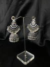 Oxidized Silver Jhumka Earrings With White Stones.