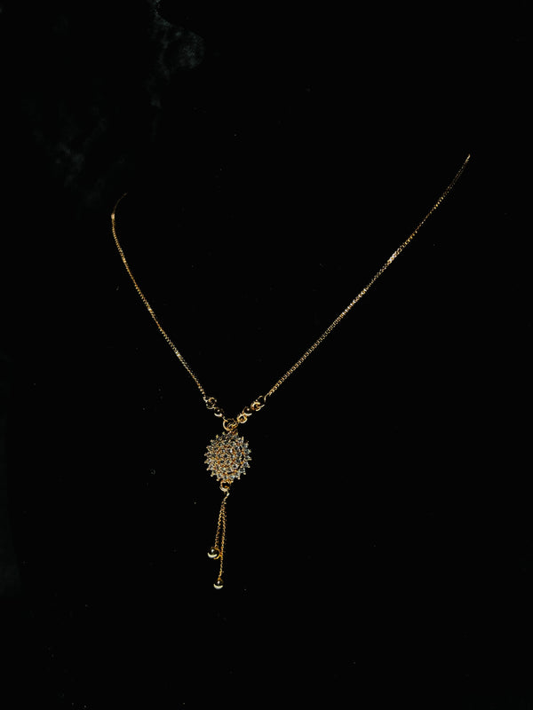 Elegant Gold-Tone Floral Pendant Necklace with Crystal Detailing